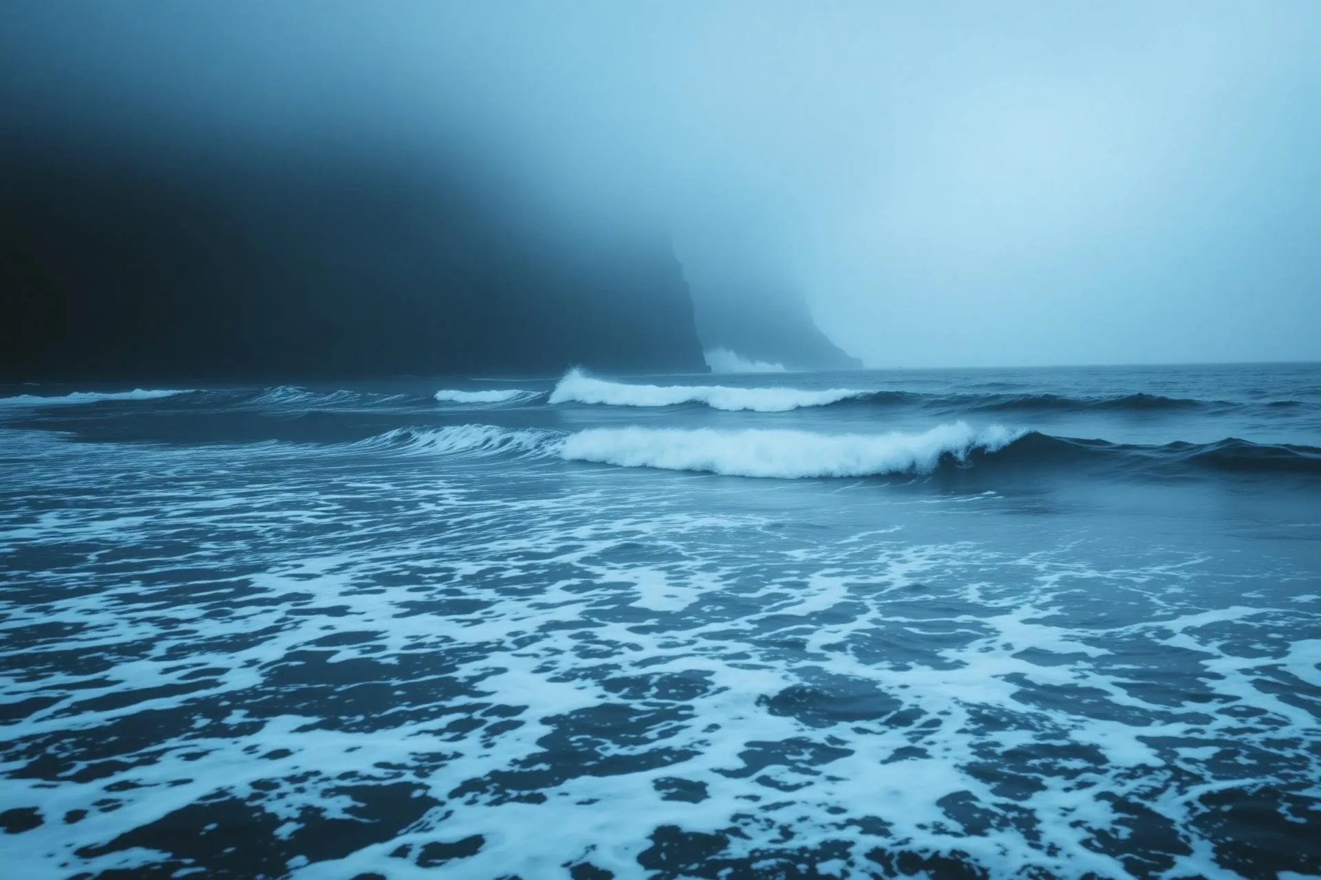 Slow fog over North Atlantic ocean at dusk